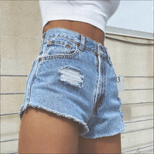 Load image into Gallery viewer, Levi’s Cut-Offs (size 2)
